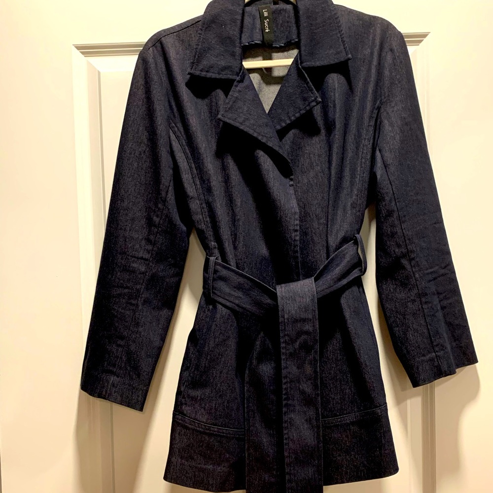 Denim jacket. Cross body allows for adjustments.